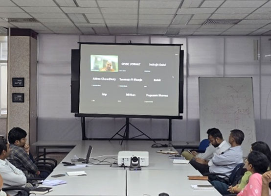 Participants attending the session both virtually and offline, engaging in discussions 